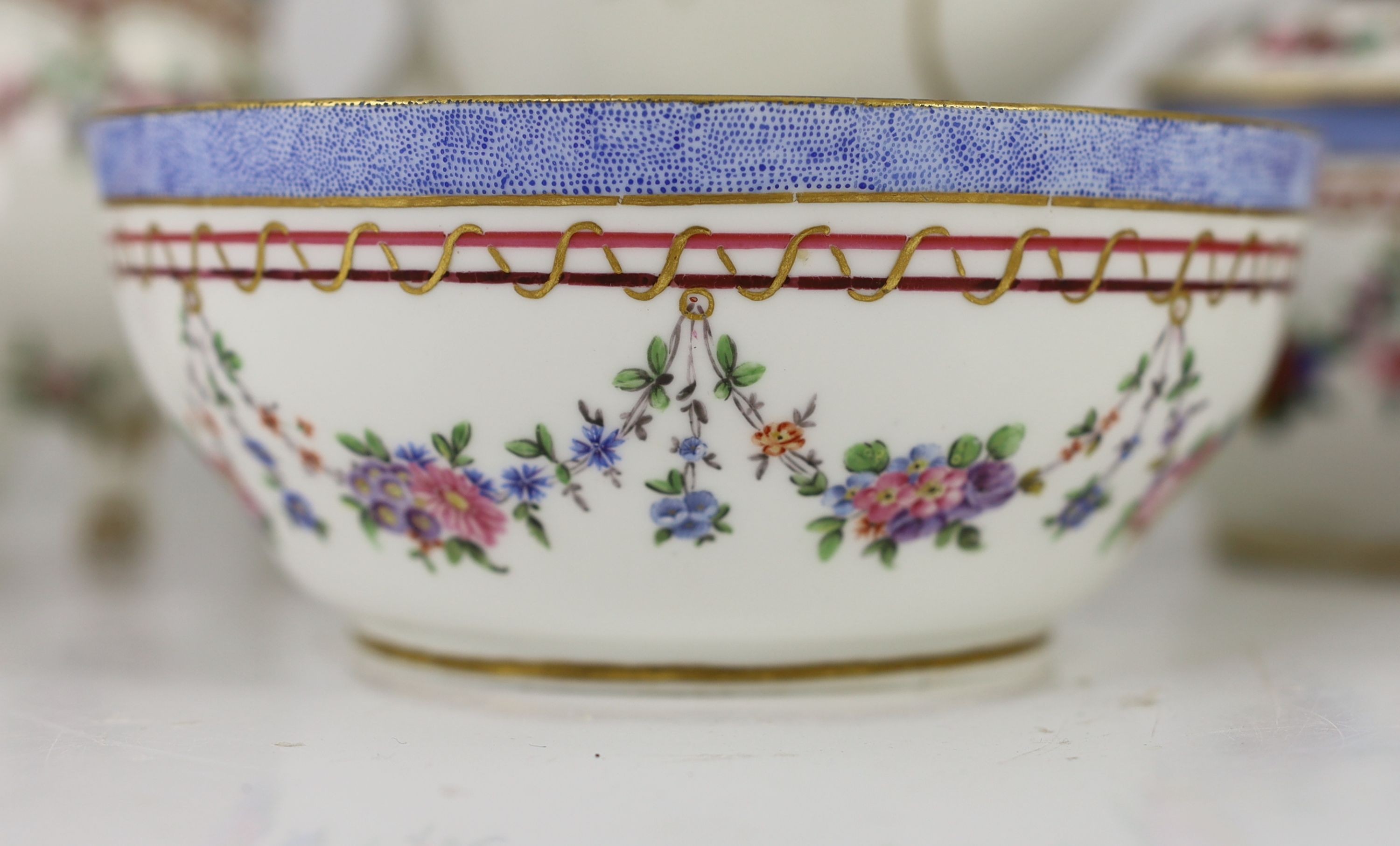 A Sevres porcelain part tea service, c.1772-3, One teacup handle repaired